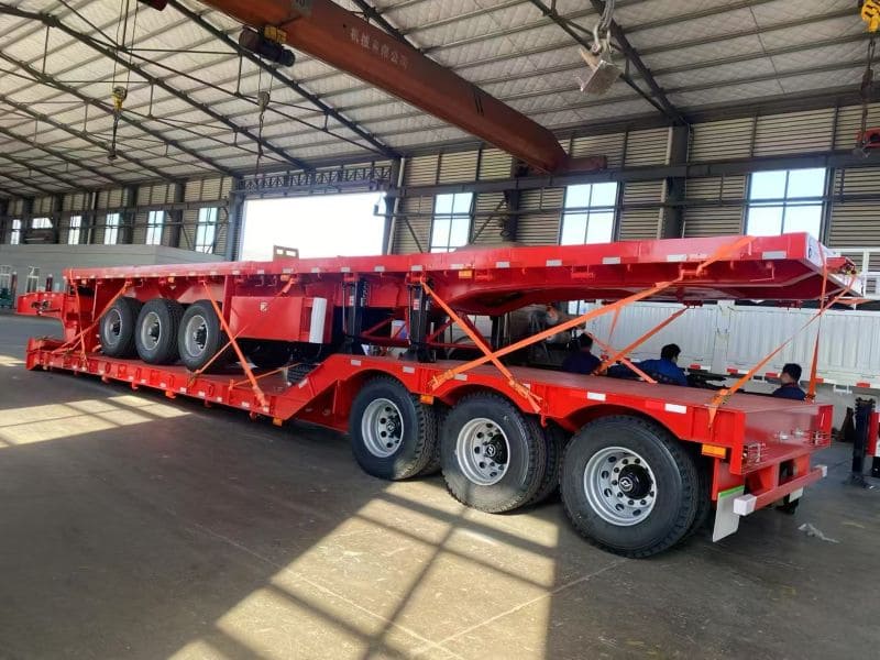 سيتم إرسال مقطورة Gooseneck Lowboy ومقطورة مسطحة قابلة للفصل إلى المكسيك